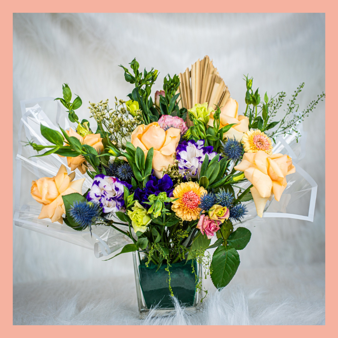 Fresh roses and lilies birthday arrangement Abu Dhabi