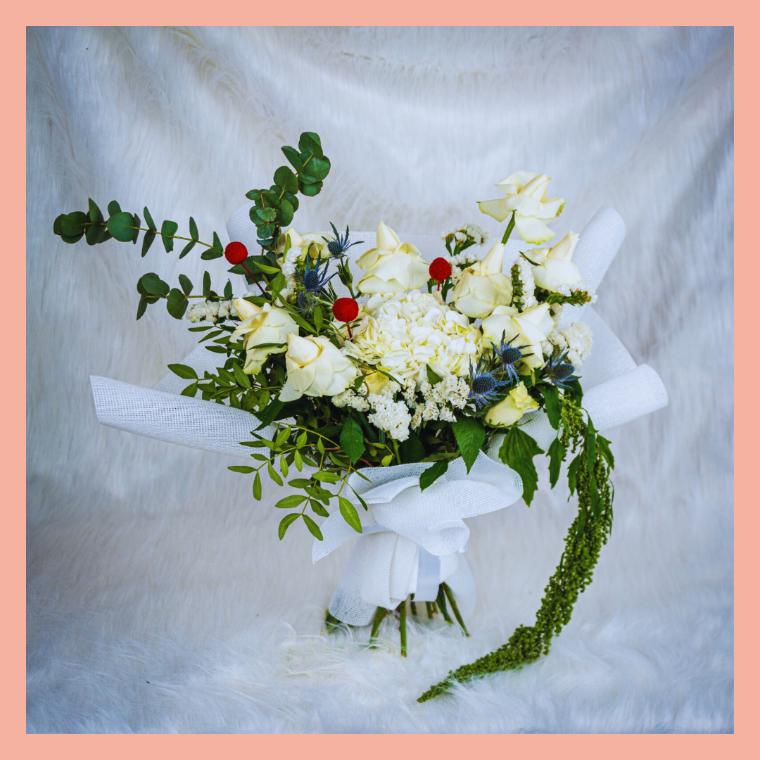 Elegant red rose anniversary bouquet by Le Ronza Flowers